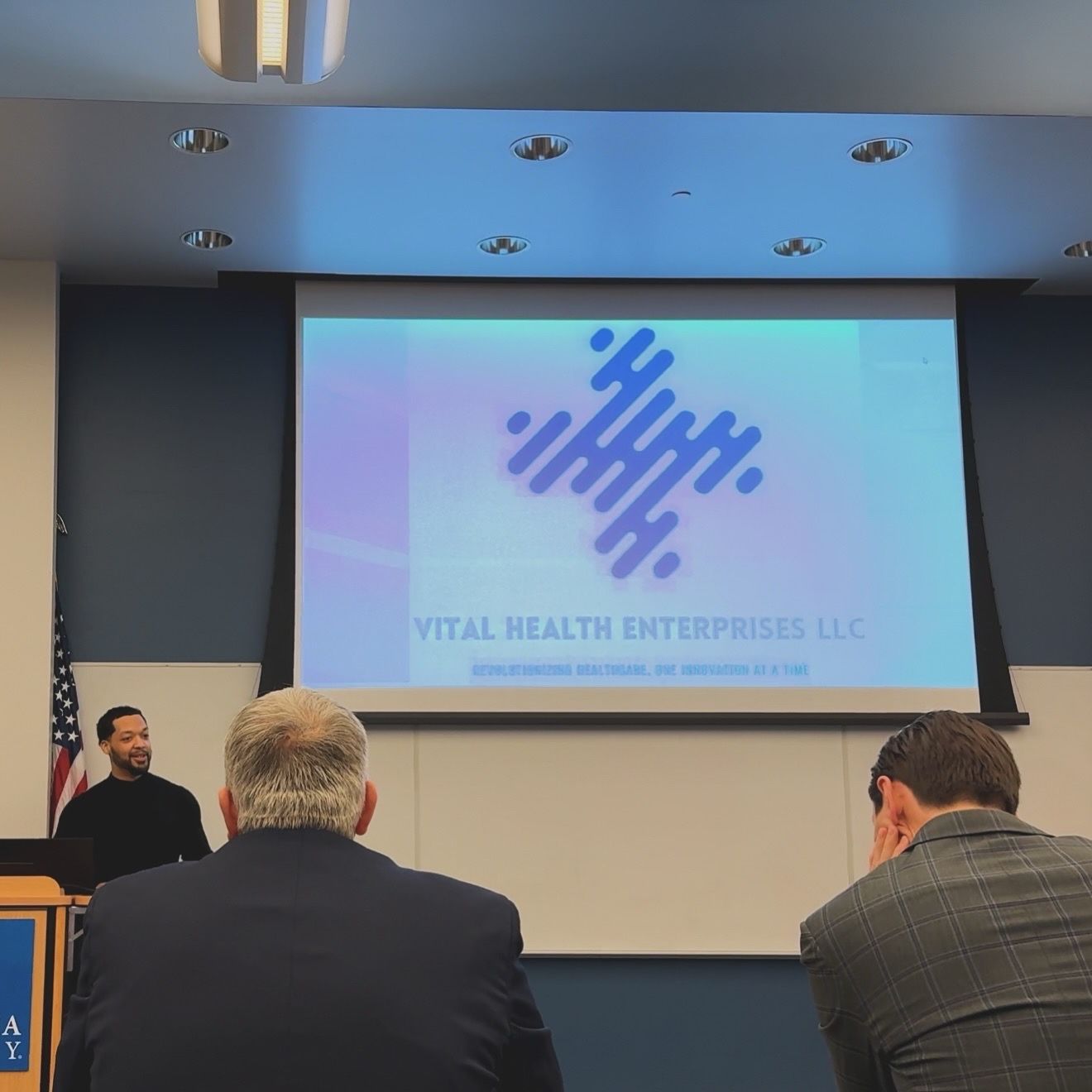 Angel Diaz Jr. presenting Vital Health Enterprises to an audience